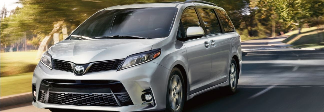 2020 Toyota Sienna driving down a winding road